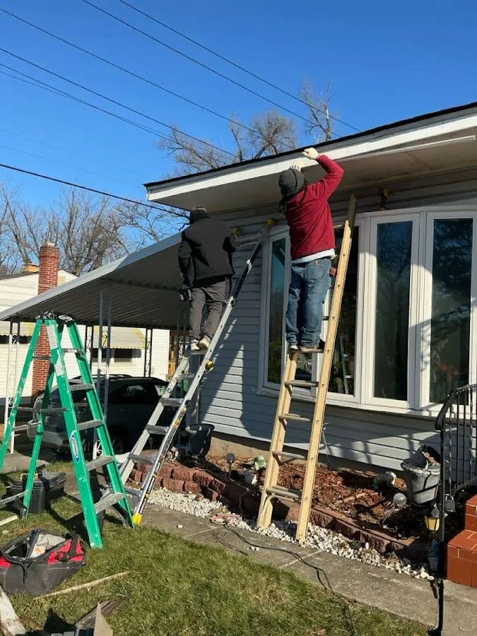 Restoration crew performing exterior repair in Webster